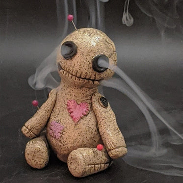 left-doll-statue-sculpture